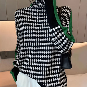 Women's houndstooth high neck wool sweater featuring a stylish tartan pattern with long sleeves and a fitted waist.