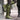 Insulated waterproof leather riding boots in green, size 43, shown worn by a person standing on grass. The knee-high boots are paired with denim jeans, highlighting their thermal design suitable for winter equestrian activities.