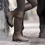 Insulated waterproof leather riding boots in dark brown, size 43, featuring a thermal lining for winter equestrian activities.