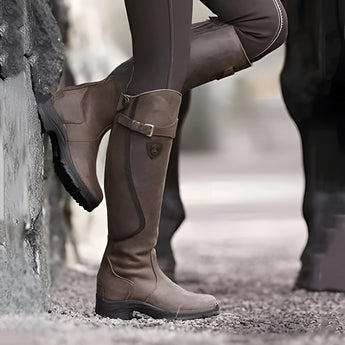 Insulated waterproof leather riding boots in dark brown, size 43, featuring a thermal lining for winter equestrian activities.