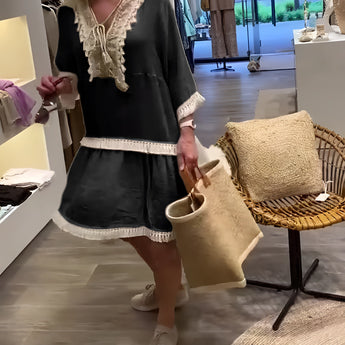 Ivory Boho Chic Lace Trim Tunic with lightweight design, featuring delicate lace accents and a relaxed fit suitable for summer, styled as a dress with fashionable elements.