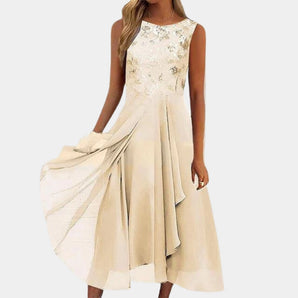 Ivory lace applique high-low evening dress in yellow, featuring an elegant formal design with intricate lace details and a high-low hemline. The dress is modeled by a fashion model and showcases a one-piece garment with a focus on the shoulder, arm, neck, waist, and sleeve areas, suitable for formal events or bridal parties. Size 3XL.