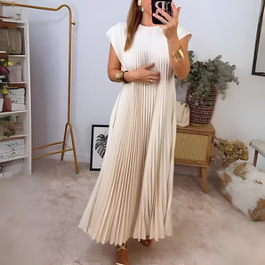 Ivory pleated maxi dress with cap sleeves, featuring a flowy design suitable for evening wear, shown in a beige color in size 3XL.