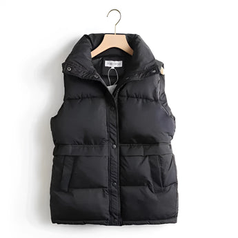 Ivory quilted sleeveless lightweight puffer vest with a high collar, designed for winter fashion, shown in black color and size XL.