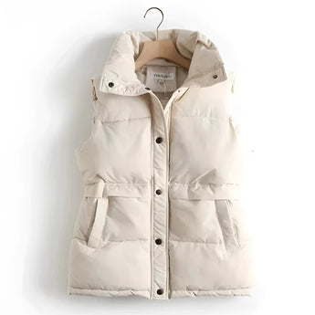 Ivory quilted sleeveless lightweight puffer vest in a beige color, size XL, featuring a fashionable design ideal for winter wear.