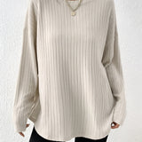 Ivory ribbed crew neck women's sweater in beige, featuring long sleeves and a casual chic design suitable for fall fashion, displayed in size 2XL.