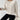 Ivory ribbed crew neck women's sweater with long sleeves, showcasing a casual chic fall fashion style.