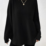 Ivory ribbed crew neck women's sweater in a casual chic fall fashion style, featuring long sleeves and a comfortable fit, shown in Nero color and 2XL size.