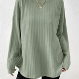 Ivory ribbed crew neck women's sweater in green, size 2XL, showcasing a chic and casual fall fashion style with a focus on the neckline and shoulder details.