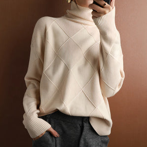 Ivory ribbed turtleneck sweater in beige, featuring long sleeves and a cozy, chic design for women's winter fashion, shown in a 2XL size.