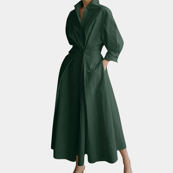 Ivory satin trench coat in a green color, featuring a fashionable collar and long sleeves, designed as an elegant winter overcoat in a one-piece style, shown in size 3XL.