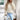 Ivory women's lightweight cable knit sweater featuring a stylish fall pullover design with long sleeves and a round neckline.
