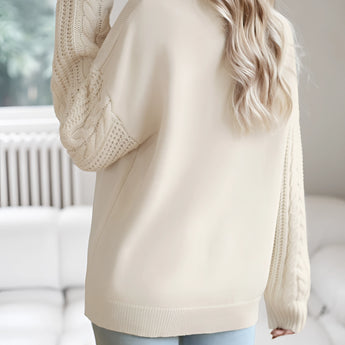 Ivory women's lightweight cable knit sweater featuring long sleeves, a comfortable fit, and a stylish design suitable for fall wear.
