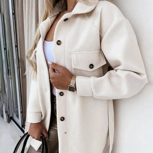 Ivory women's luxury trench coat in a double-breasted design, featuring a white color, stylish collar, long sleeves, and tailored waist, available in size 3XL.