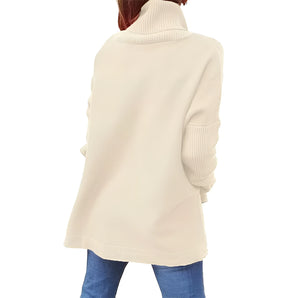 Ivory women's oversized cozy turtleneck sweater featuring a relaxed fit, long sleeves, and a soft, knit texture ideal for casual winter wear.