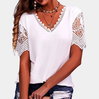 Lace Sleeve V-Neck Crochet Blouse in white, 3XL size, featuring intricate lace sleeves, a flattering V-neckline, and bohemian crochet detailing, modeled on a mannequin showcasing the shoulder, arm, and waist areas.