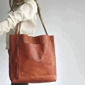 Brown Caramel Handmade Leather Tote Bag for Women, featuring a spacious design ideal for work, with sturdy shoulder straps and a sleek, elegant finish.