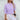 Lavender cable knit puff sleeve sweater for women, featuring intricate knit patterns on the sleeves and body. The sweater is styled with puffed sleeves and a round neckline, adding a fashionable touch to the outfit. The color is a soft purple hue.