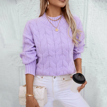 Lavender cable knit puff sleeve sweater for women, featuring intricate knit patterns on the sleeves and body. The sweater is styled with puffed sleeves and a round neckline, adding a fashionable touch to the outfit. The color is a soft purple hue.