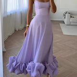 Elegant lavender maxi dress with spaghetti straps and a ruffled hem, resembling a wedding gown, in a viola shade and XL size.