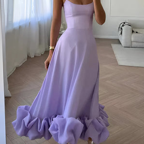 Elegant lavender maxi dress with spaghetti straps and a ruffled hem, resembling a wedding gown, in a viola shade and XL size.