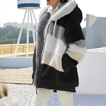 Lavender Patchwork Hooded Fur Jacket for women in a Nero color, featuring a luxurious design with black and white accents, displayed on a model wearing size 5XL. The jacket showcases detailed patchwork, a fur-lined hood, and long sleeves, perfect for winter fashion.