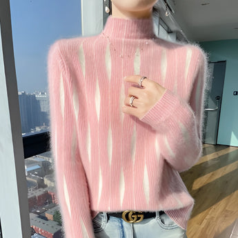 Women's pink turtleneck sweater in size 2XL, featuring a soft knit fabric and chic fall fashion design. The sweater has long sleeves, a high neck collar, and is styled to provide a comfortable fit.