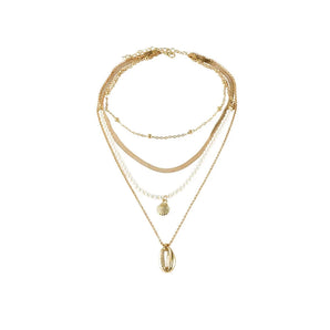 Layered gold necklaces featuring a pearl chain and seashell pendant, minimalist jewelry style.