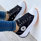 Women's LED sneakers with neon sole, rechargeable, fashionable light-up shoes, black color, size 43, worn with jeans.