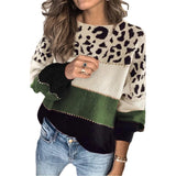 Women's trendy casual knit pullover sweater featuring a leopard print color block design in green, styled with long sleeves and a comfortable fit. The sweater is paired with blue jeans, showcasing a stylish and casual look.