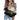 Women's trendy casual knit pullover sweater featuring a leopard print color block design in green, styled with long sleeves and a comfortable fit. The sweater is paired with blue jeans, showcasing a stylish and casual look.