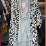 Leopard print designer kimono in a foggy gray pattern, displayed on a clothes hanger, showcasing its long sleeves and open front design.