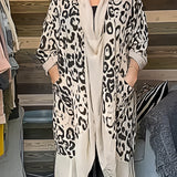 Leopard Print Designer Kimono in a chic animal print, featuring a loose-fitting style with long sleeves, modeled by a person wearing eyewear. The kimono is displayed in a 3XL size, incorporating a pattern that combines leopard and cactus elements, against a neutral background.