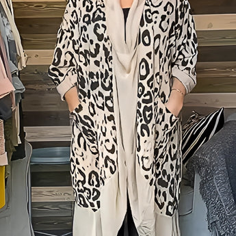 Leopard Print Designer Kimono in a chic animal print, featuring a loose-fitting style with long sleeves, modeled by a person wearing eyewear. The kimono is displayed in a 3XL size, incorporating a pattern that combines leopard and cactus elements, against a neutral background.