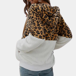 Leopard print fleece-lined women's winter hoodie with a cozy pullover design, featuring long sleeves and a comfortable fit.