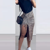 Leopard Print High-Waist Pencil Skirt in Nero, size XL, showcasing the chic animal print design with a tailored fit that highlights the waist and extends to just above the knee.