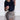 Leopard print high-waist pencil skirt worn by a model, showcasing chic animal print fashion, with focus on upper body and waist area highlighted against a plain background.