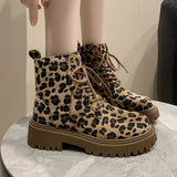 Leopard print lace-up women's combat boots with a chunky sole, featuring a bold and fashionable design.