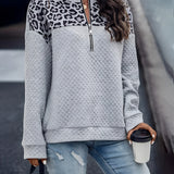 Women's Leopard Print Quilted Half-Zip Gray Pullover, featuring a chic streetwear design, with a white and black leopard pattern, long sleeves, and a comfortable fit.