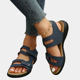 Leopard print slip-resistant women's sandals in blue, size 42, being worn by a model, showcasing trendy summer footwear style.