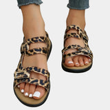 Leopard Print Slip-Resistant Women's Sandals in size 42 being worn, showcasing a trendy summer footwear design with a leopard pattern, highlighting the slip-resistant sole and fashionable appeal.