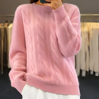 Light blue cable knit crewneck sweater for women showcasing the cozy winter fashion design with detailed shoulder and sleeve textures.