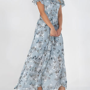 Light blue floral print maxi dress with ruffle sleeves, featuring a fitted waist and flowing silhouette, suitable for daytime wear, shown in size 3XL.