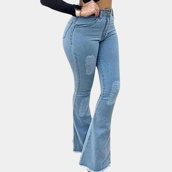 
A person wearing dark blue high waist flare jeans, styled with a retro stretch bell-bottom design. The jeans feature a fitted waist and thighs, with a slight flare towards the bottom, made from denim fabric. The model is dressed in casual attire, and a watch is visible on their wrist.