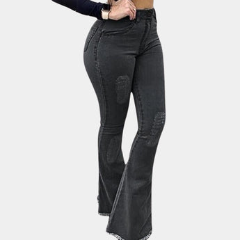 Light blue high waist flare jeans with a retro bell bottom design, showcasing a stretchy denim fabric. The jeans have a fitted waist and thigh, flaring out at the knee to create a classic 1970s silhouette.