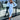 Light blue sleeveless midi dress styled with sunglasses, highlighting a chic summer fashion look. The dress is complemented by a pair of fashionable shoes, showcasing the outfit's elegance and comfort.