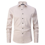 Light blue slim fit men's dress shirt made from a breathable cotton blend fabric, featuring a classic collar and long sleeves.