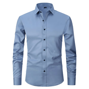 Light blue slim fit men's dress shirt made from a breathable cotton blend, featuring long sleeves, a pointed collar, and button-up front, suitable for formal wear.