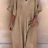 Light Blue V-Neck Ruffle Sleeve Loose Fit Summer Dress - Cotton Tunic worn by a model, showcasing shoulder to knee length, with focus on the arm and waist areas.