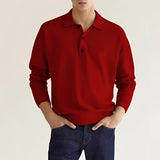 Men's long sleeve knit polo sweater in light gray, featuring a relaxed fit and a collar.